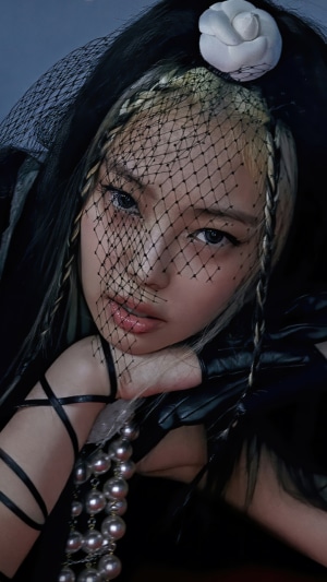 Jennie from BLACKPINK with veil and pearls