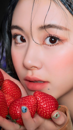 Chaeyoung from TWICE holding strawberries