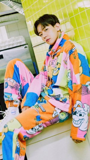 Baekhyun in colorful cartoon print outfit