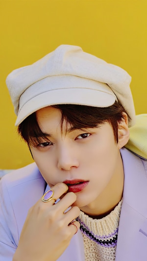 Lee Minhyuk from Monsta X wearing a hat
