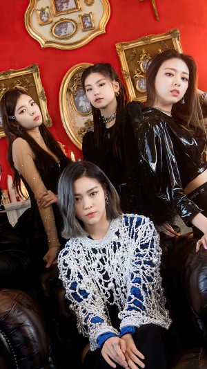 ITZY Kpop Girls posing in a room