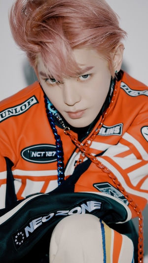Taeyong from NCT 127 wearing a racing jacket