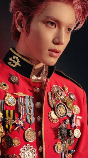 Taeyong from NCT 127 in a red military uniform