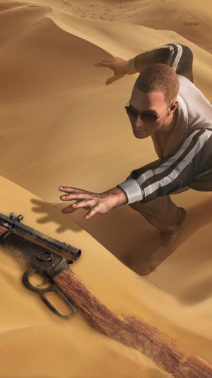Man in sunglasses reaching for a rifle in the desert