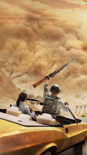 PUBG Mobile players in a car during a sandstorm