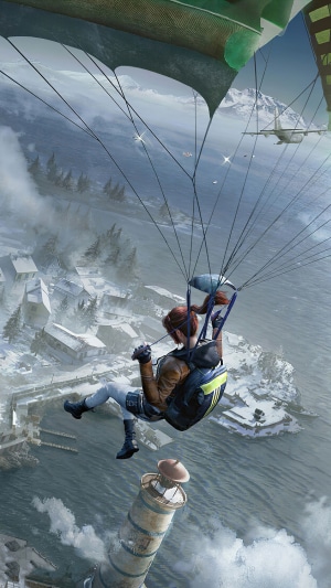 PlayerUnknown's Battlegrounds character parachuting over a snowy village