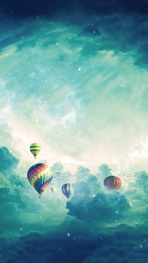 Hot Air Balloons Flying Through Clouds