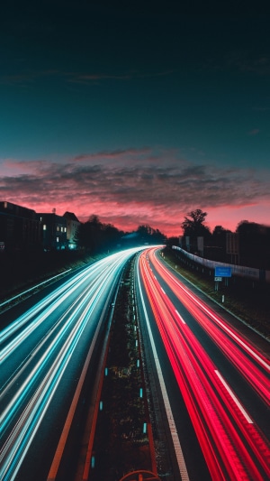 Highway at Sunset with Light Trails
