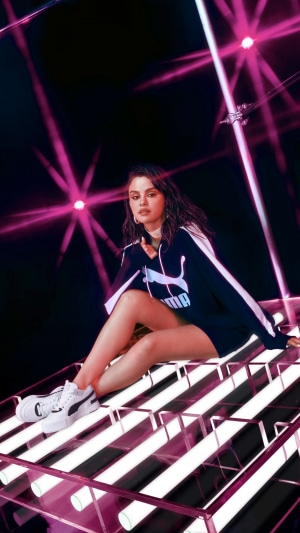 Selena Gomez in Puma tracksuit and sneakers