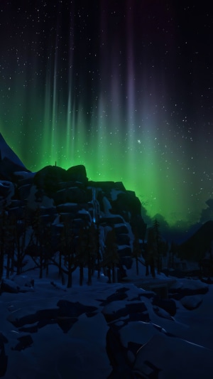 Aurora Borealis over a Snowy Mountain Landscape