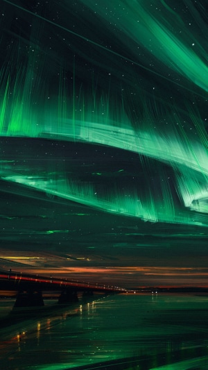 Aurora Borealis over a bridge and water
