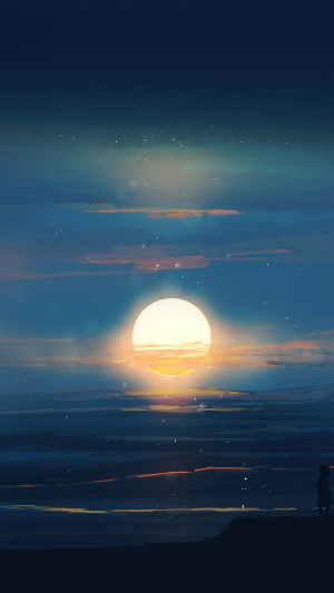 Sunset over the ocean with a lone figure