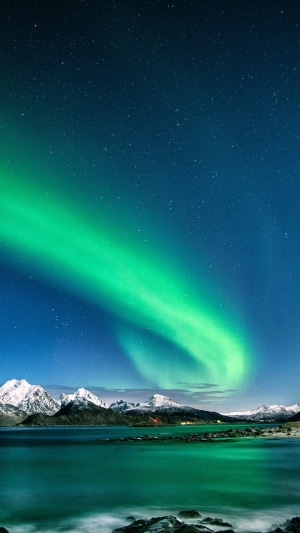 Aurora Borealis over Mountains and Water
