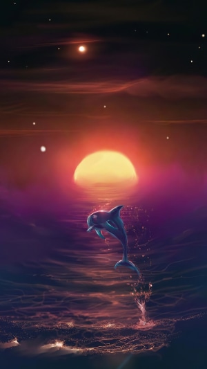 Dolphin jumping out of the ocean at sunset