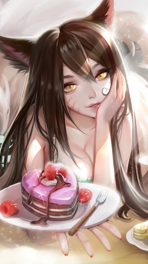 Ahri from League of Legends with a heart-shaped cake