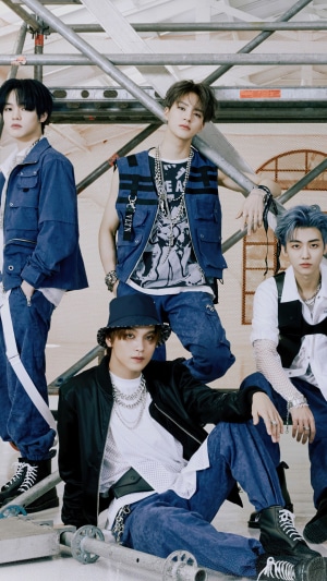 NCT Dream members in blue outfits