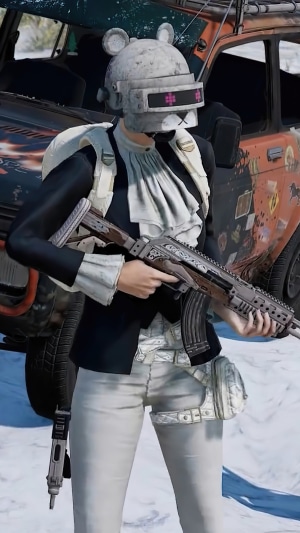 Player from PUBG holding a rifle