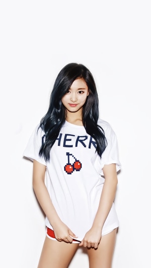 Tzuyu from TWICE in a white t-shirt and red shorts