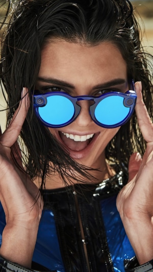 Kendall Jenner wearing blue sunglasses