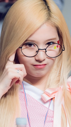 Sana from TWICE wearing glasses