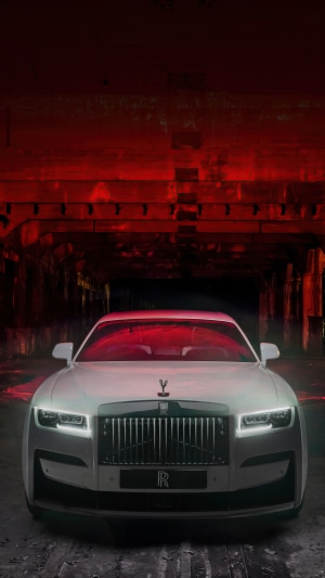 White Rolls-Royce Ghost in a red tunnel