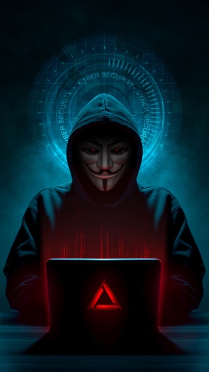 Anonymous hacker in hoodie with laptop, cyber security theme