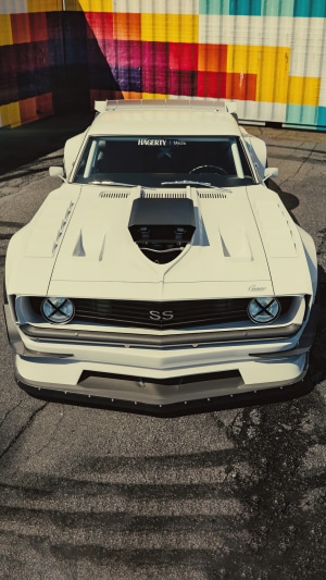 White Chevrolet Camaro SS with Roll Cage