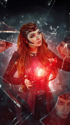 Scarlet Witch cosplay with red energy and broken glass