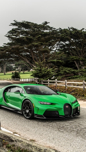 Green Bugatti Chiron on a Road with Trees