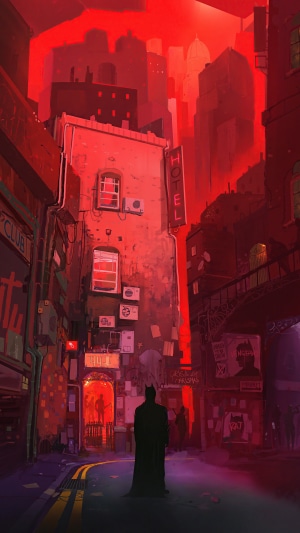 Batman in a red-lit alleyway