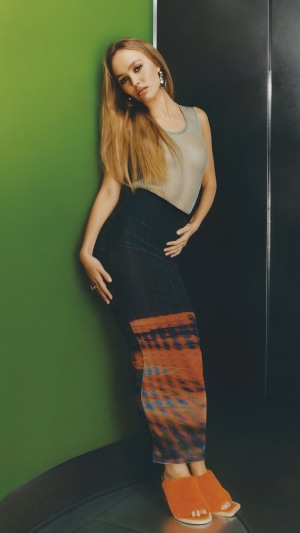 Lily-Rose Depp posing in a studio