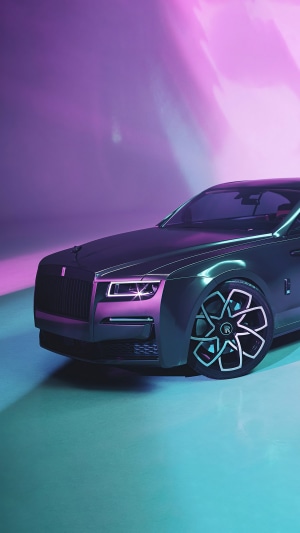 Rolls-Royce Wraith car with purple and teal lighting