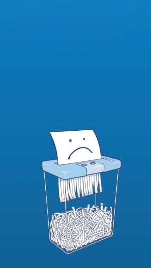 Sad paper being shredded
