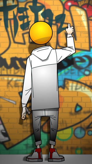 Graffiti artist with a yellow head painting on a brick wall