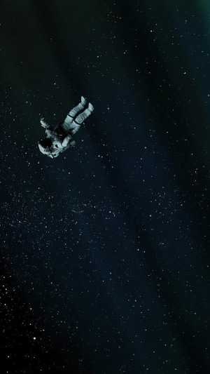 Astronaut floating in a starry digital universe