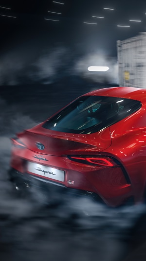Red Toyota Supra Drifting with Smoke