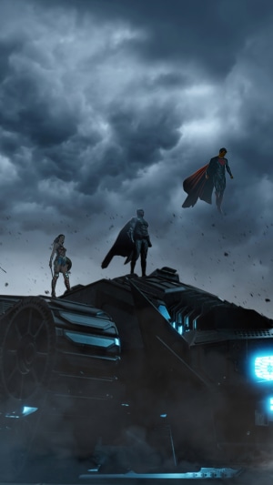 Superman, Batman, and Wonder Woman on a vehicle