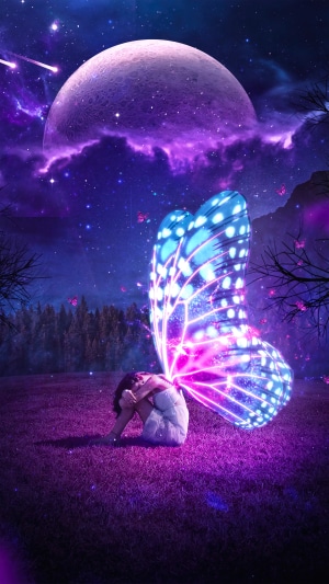 Girl with glowing butterfly wings under a large moon