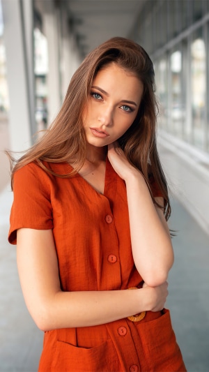 Model in orange dress