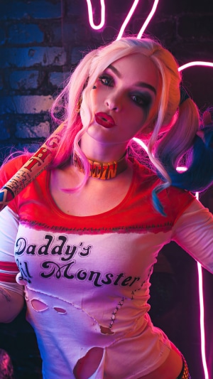 Harley Quinn with baseball bat and axe