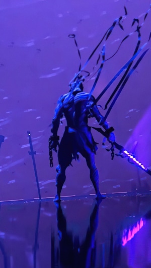 Warrior with glowing sword and chains