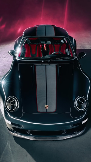 Black Porsche 911 with red interior