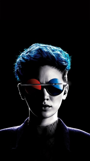 Person with blue hair and 3D glasses