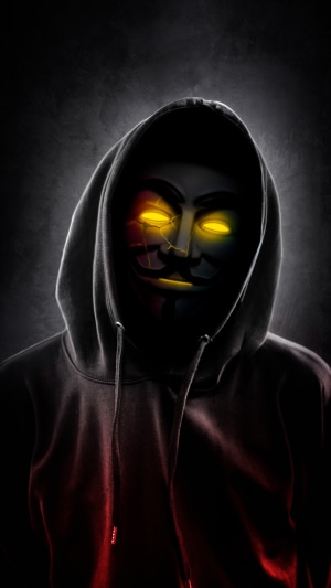 Anonymous mask with glowing eyes and hoodie