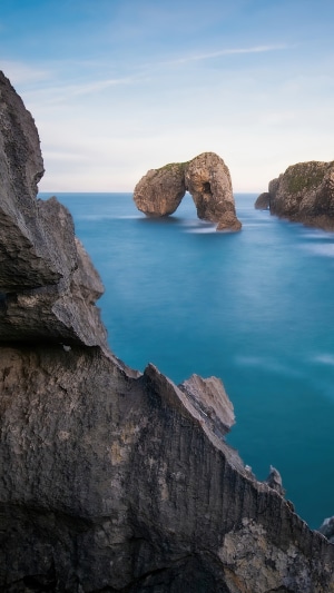 Sea arch rock formation on the coast
