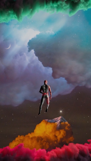 Man floating in colorful clouds with moon and star
