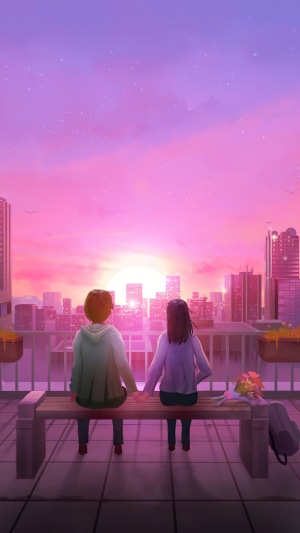 Couple holding hands watching sunset over city skyline