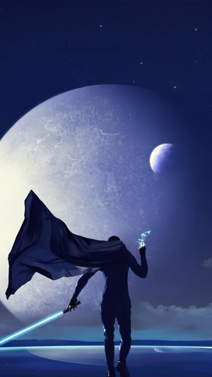 Man with blue lightsaber and cape on alien planet