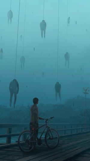 Figures hanging from wires over a bridge