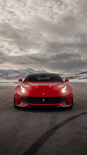 Red Ferrari F12 TDF in snowy mountains 4K